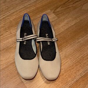 Rothy's Cream and Black Flats with Classic Design